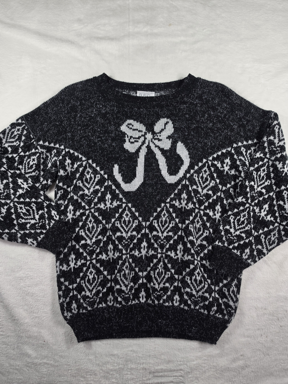 Men's Black & White Patterned Knit Sweater with Bow Accent